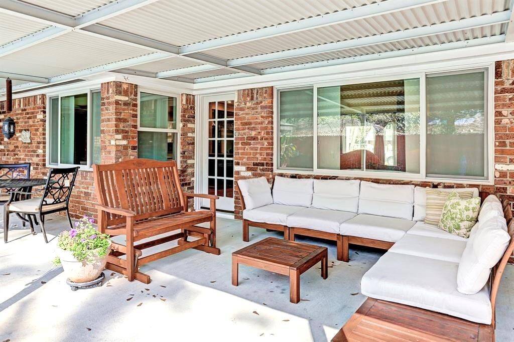 A view of sellers deco for the covered patio overlooking the pool. Seller's decor.