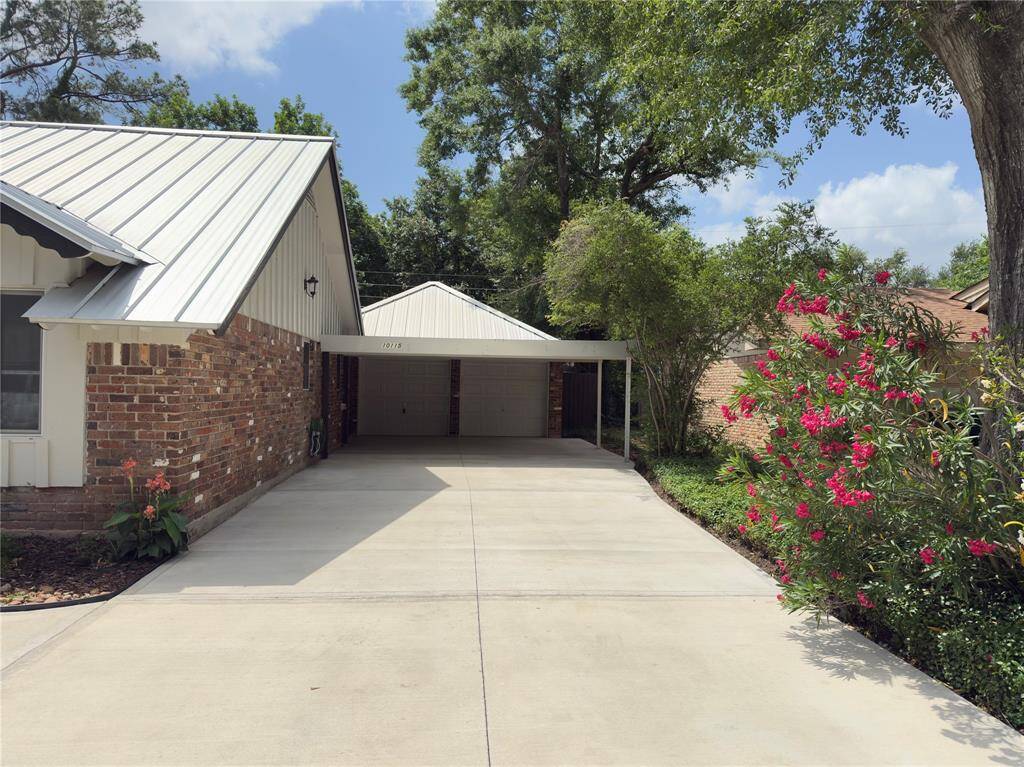 Carport and new driveway can hold 8+ cars