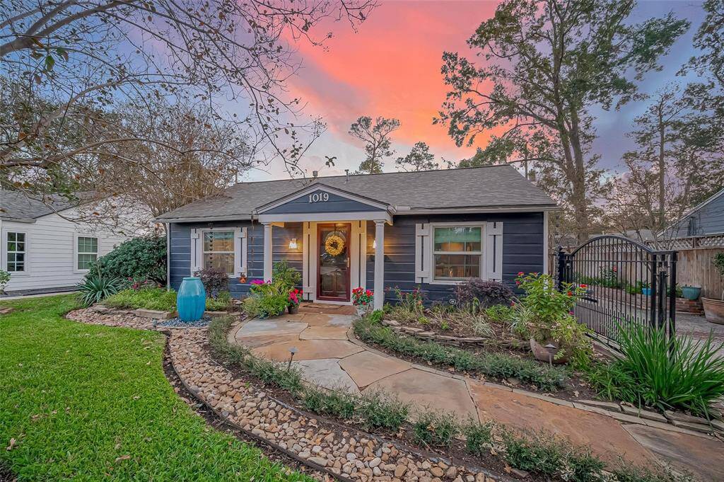 Putting the "garden" in Garden Oaks, this completely updated Bungalow is nestled within one of the most beautiful gardens you have seen.