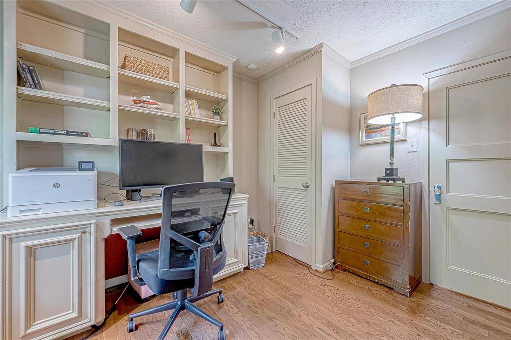 Middle bedroom has built in shelves and is perfect as a study or bedroom!