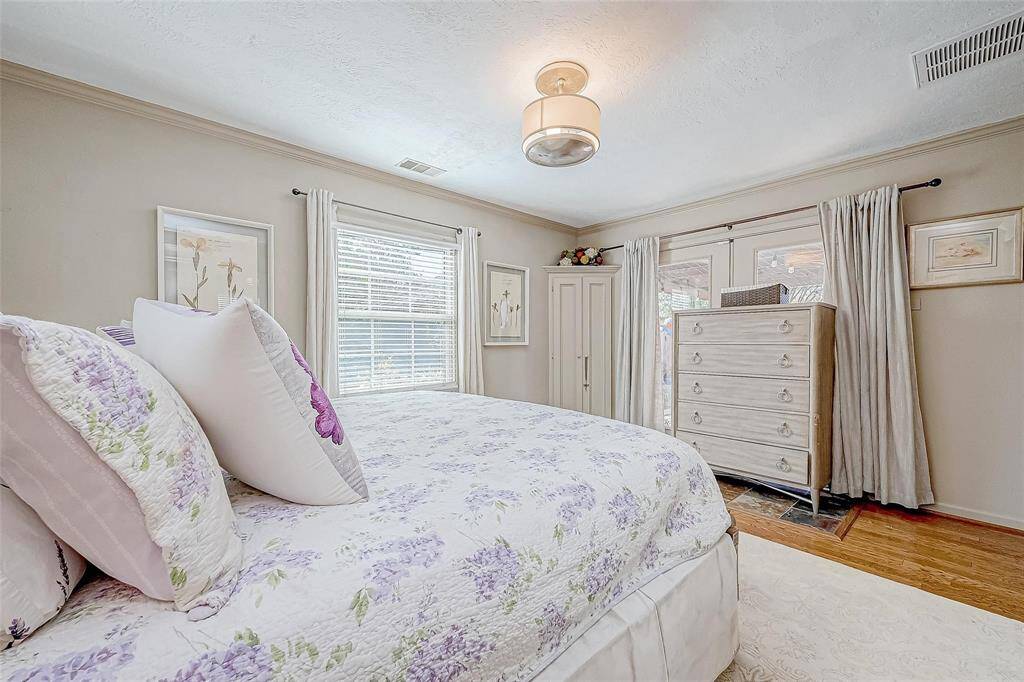 French doors in back bedroom lead directly to pergola.