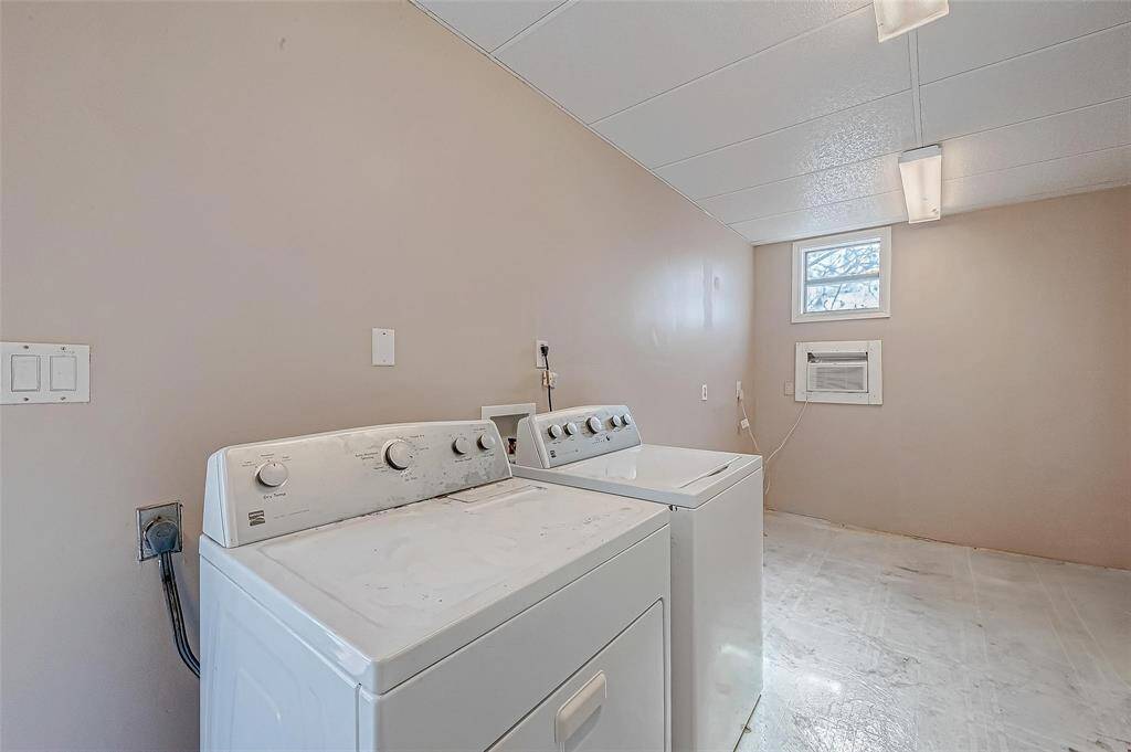 Washer and dryer included!  Utility room attached to oversized garage!