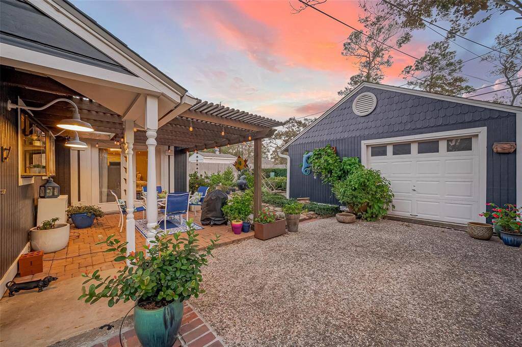 I mean, how perfect is this?  Oversized garage already has plumbing and electric, there have been plans drawn up to make it a guest house, located further in the photos.