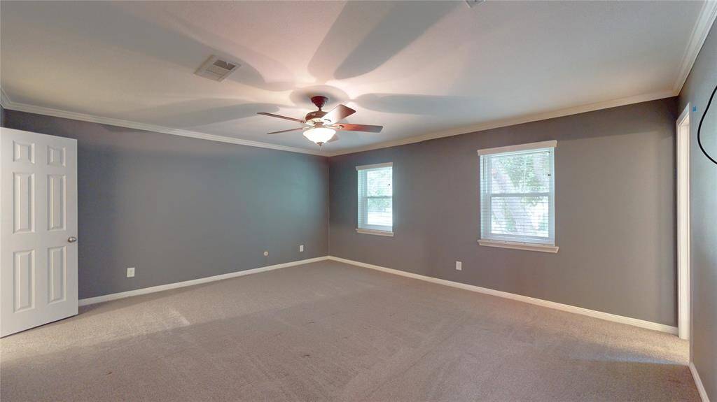 The primary bedroom is located on the second floor and offers plenty of room for all your furniture needs.