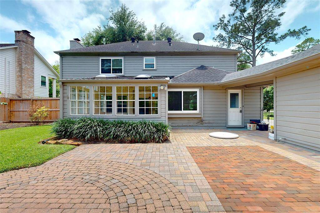 Exterior of the home updated with exterior paint and double pane windows.