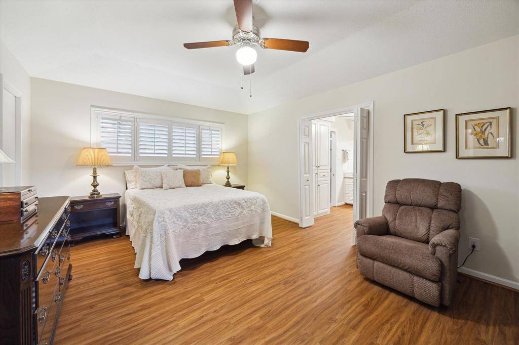 The large master bedroom has an ensuite bath and two walk-in closets.