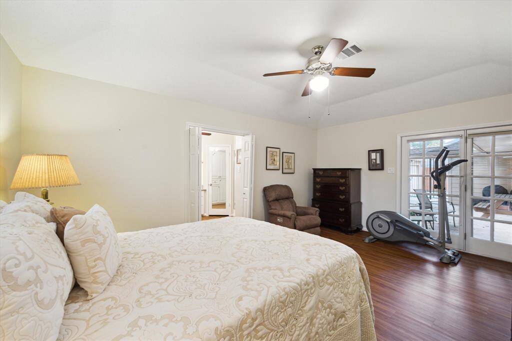 French doors leading to the patio and a high ceiling provide a brightand open atmosphere to the master.