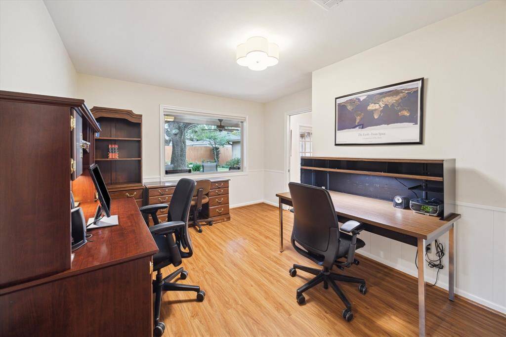 This room has a large picture window which looks out to the serene andlovely backyard.