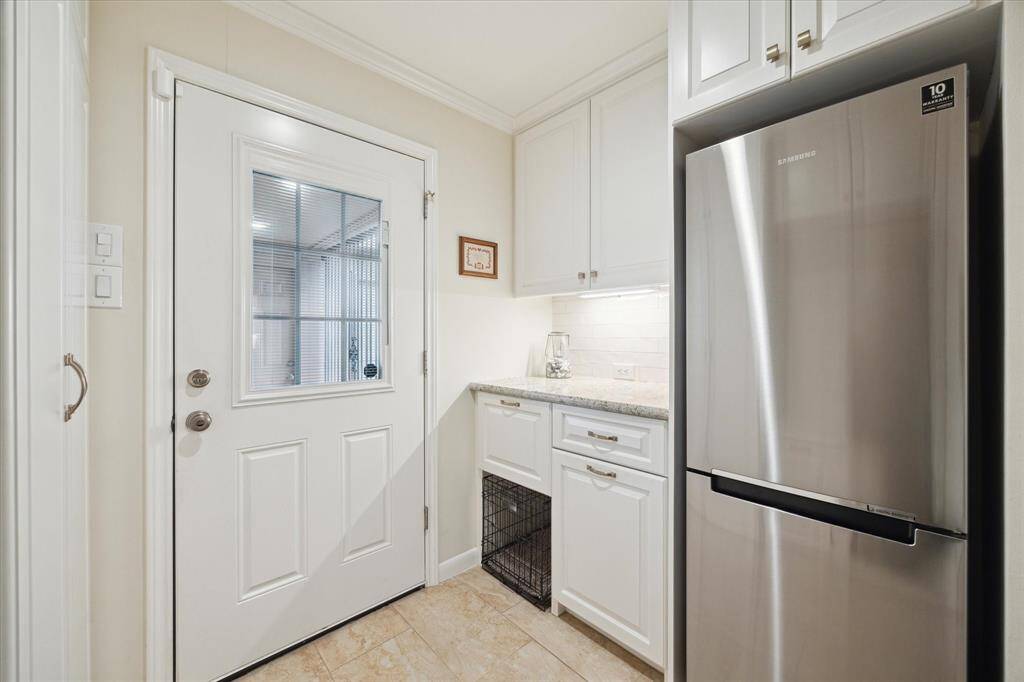 The oversized laundry includes a guilt-in recycle bin, built-in dog crate(or extra storage), and handy second refrigerator.