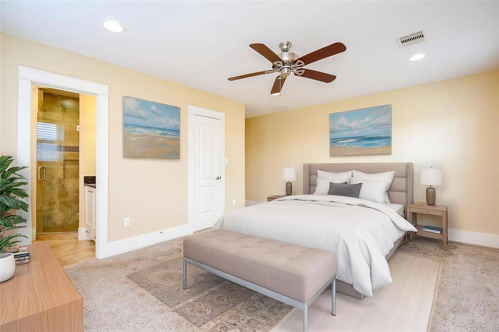 Spacious primary suite virtually staged to highlight its size and layout potential.