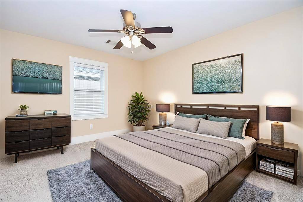 Well-sized secondary bedroom virtually staged to emphasize its spaciousness and potential.