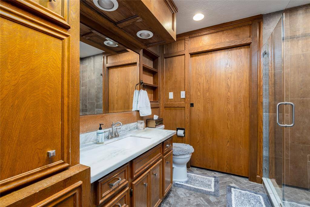 3rd bathroom has Walk In Shower and Vanity area.
