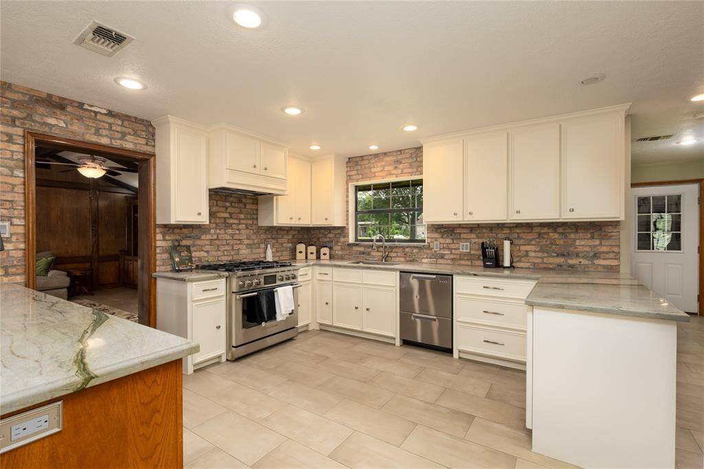 Counter tops are Quartz with brick back splash.