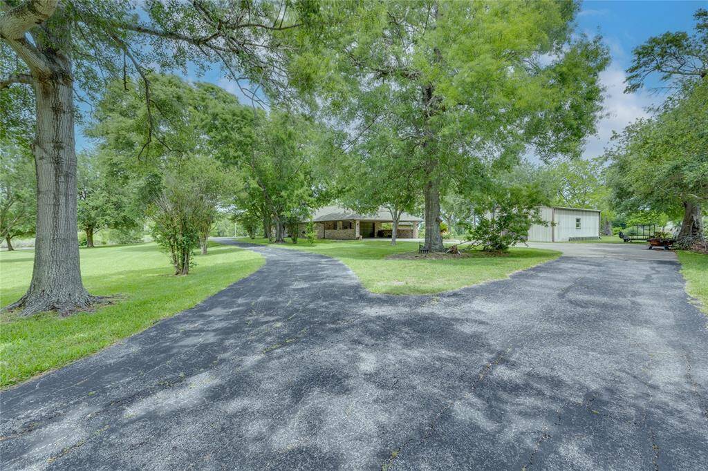 Property has a two driveways, one to the front door and the other one to the back door.