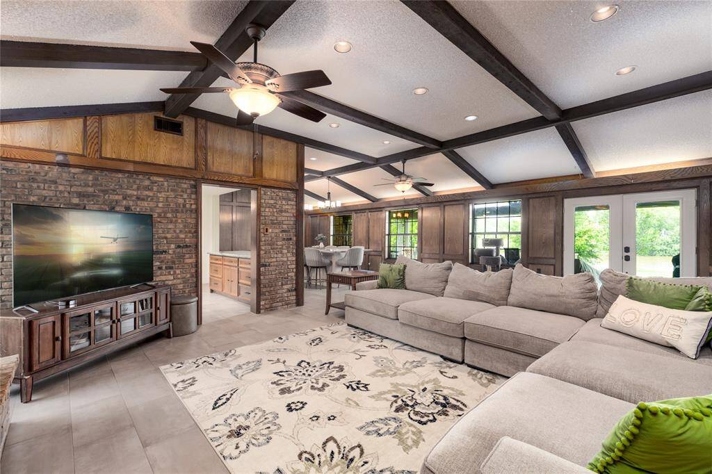 Living Room and Dinning room has Large windows to let the natural sunlight into the room.