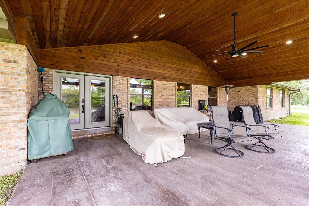Large covered porch to sit and drink your morning coffee and enjoy the Lake View..