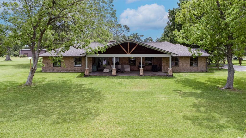 Large side porch is Great for family gathers to watch kids play or go fishing in the Lake.