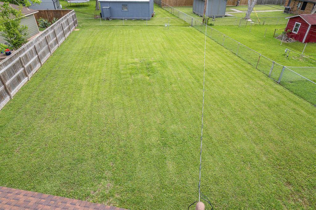 Back yard is a blank slate just waiting for your creative touch.