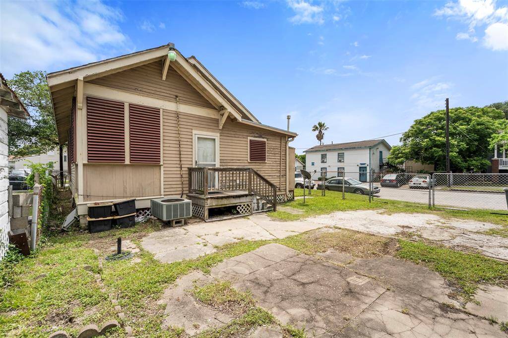 View of driveway and back of the home.