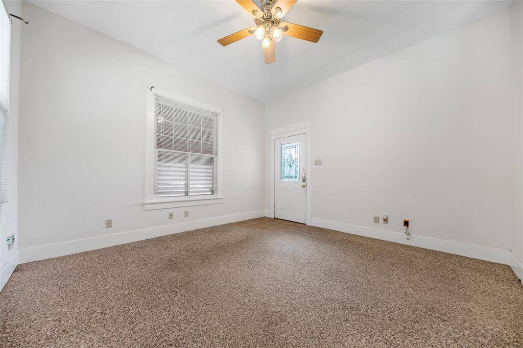 Living room with view of front door.