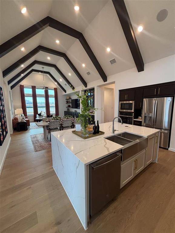 Kitchen, Dining and Living Area - Representative Photo