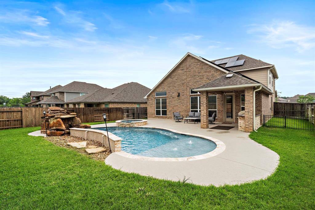 The beautifully designed pool and spa are the centerpiece of this private outdoor retreat, offering endless fun and relaxation. The spacious layout provides ample room for games, gatherings, or simply unwinding after a long day.