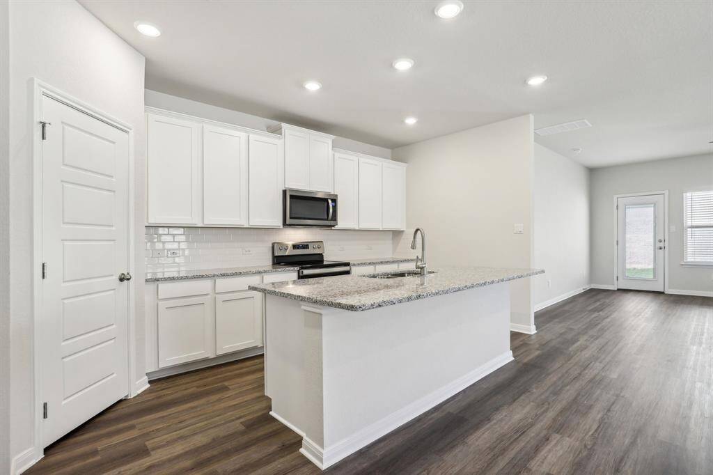 Photo is not of the actual home but is an inspirational photo of builder’s model home and may depict options, furnishings, and/or decorator features that are not included.