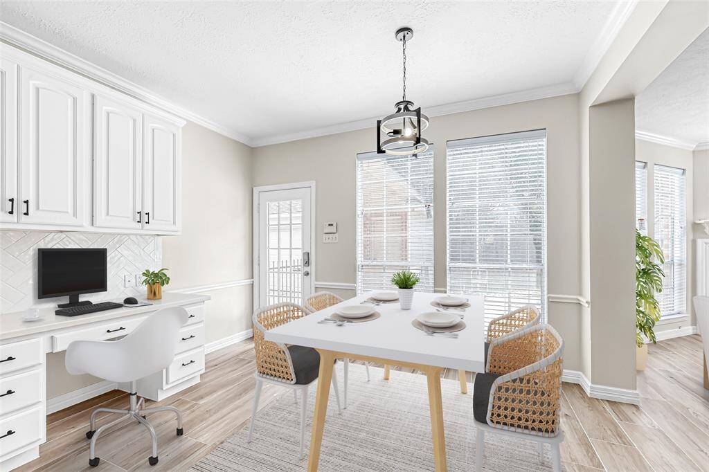VIRTUALLY STAGED DESK AREA AND BREAKFAST AREA IN KITCHEN
