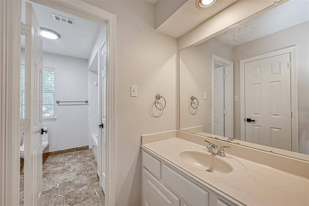 LOVELY SECONDARY BATHROOM LOCATED UPSTAIRS.