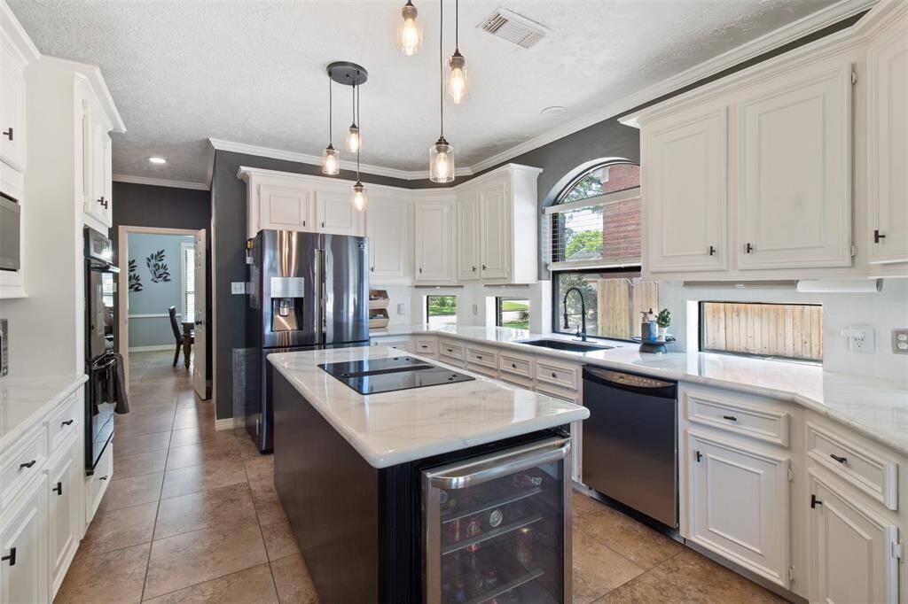 Flooded with natural light from unique windows, this space feels open and inviting.