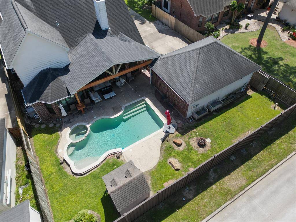 Another view which also showcases the spacious 2-car detached garage.
