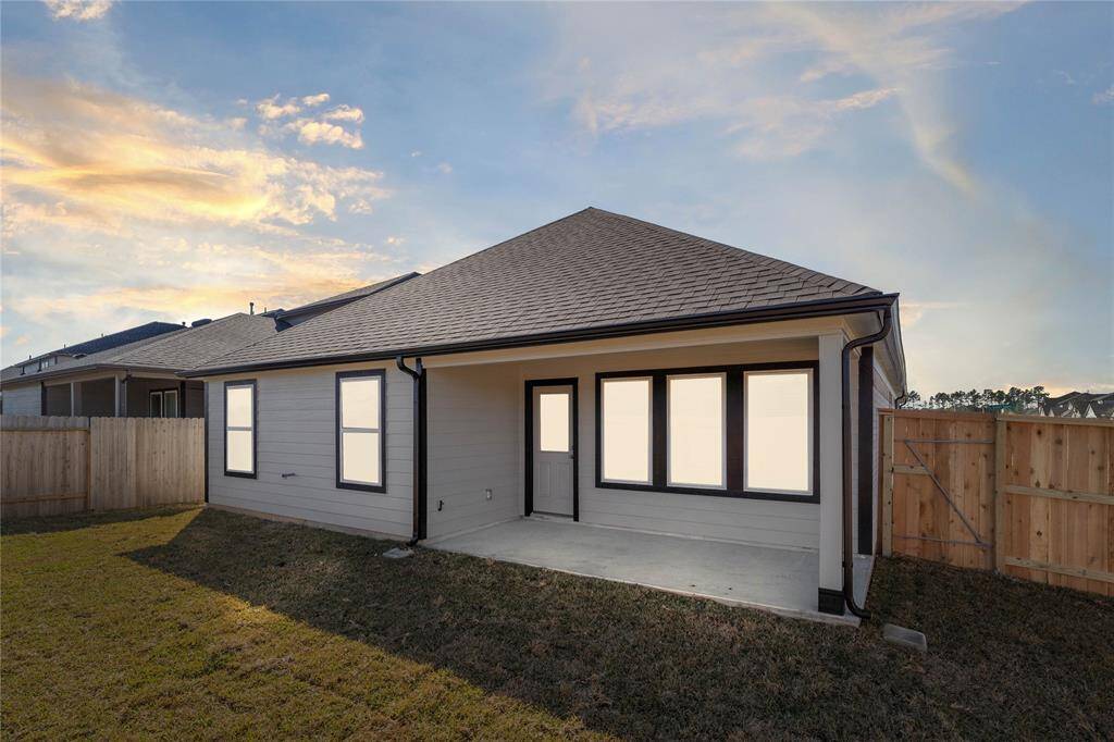 Come and see this spacious backyard with its beautiful covered patio. There is plenty of room for the kids to play and adults to relax! Perfect for your outdoor living space, patio furniture, bbq pit, and so much more. The possibilities are endless!