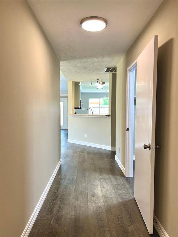 hallway. Utility room and garage on the right