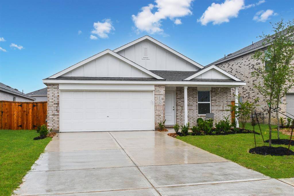 Paved walkway from your twocar garage with remote controlaccess and double widedriveway.