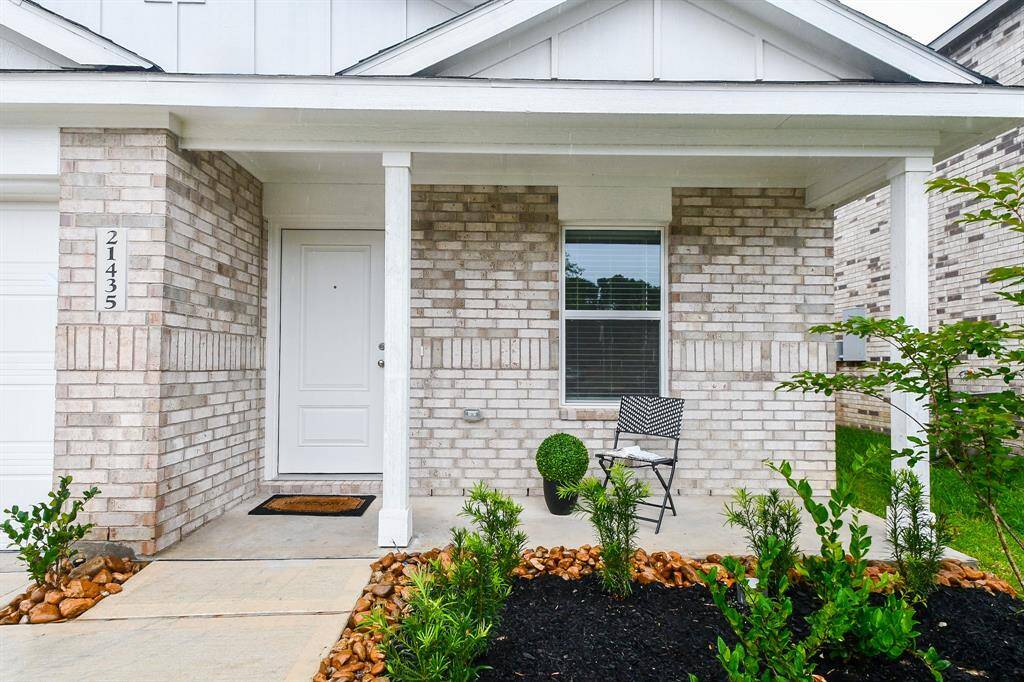 Covered entryway porch madesafe for all your Amazonpackages and for your friendsand family to dive under on arainy day.