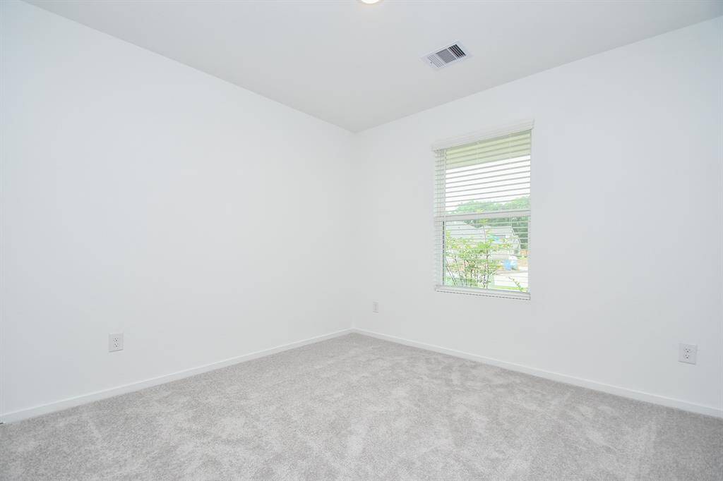One of the three secondarybedrooms all great sizes, all withcozy carpet, recessed lightingand fresh paint.