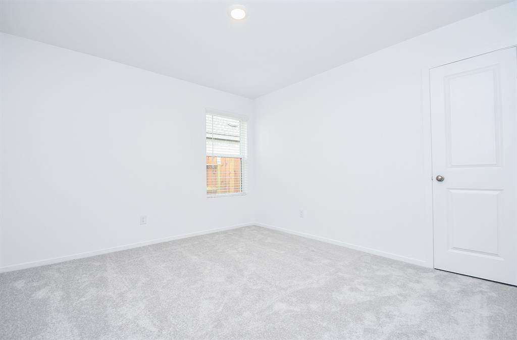 This bedroom makes a perfecthome office space for your workfrom home activities.