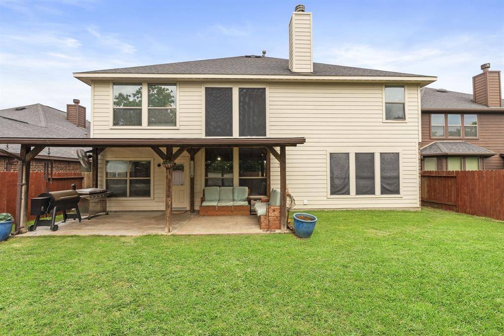 Backyard with covered patio!
