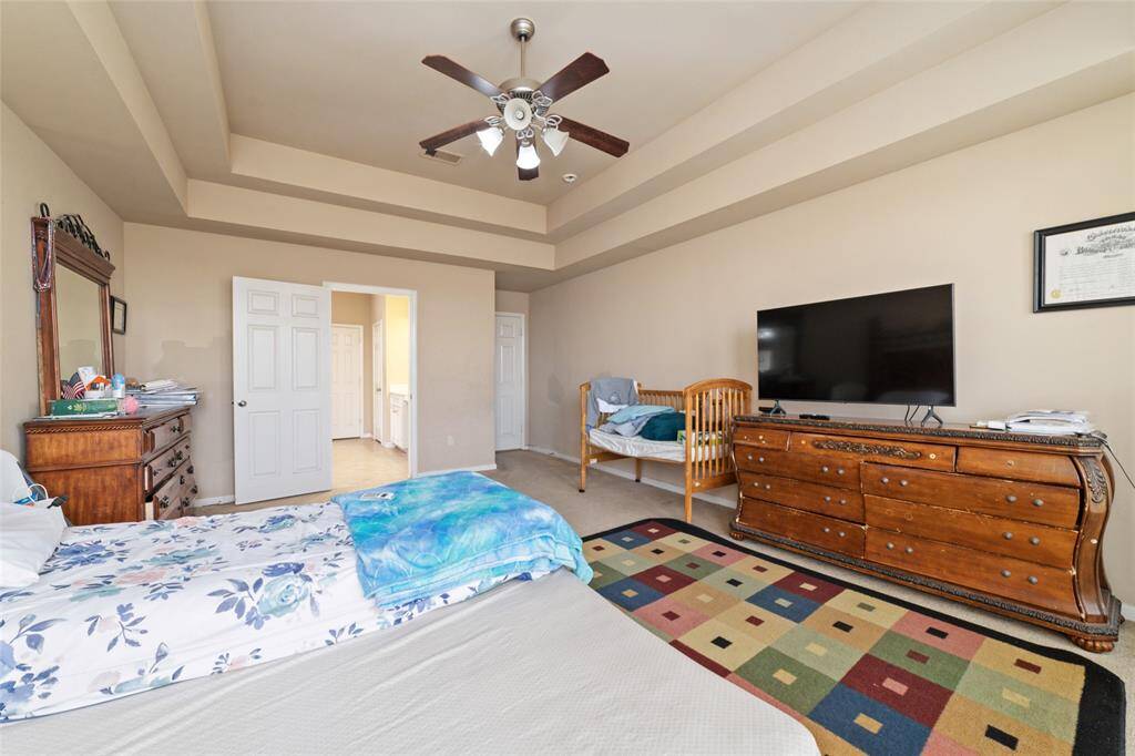 Little hall entrance to primary suite creates more privacy.