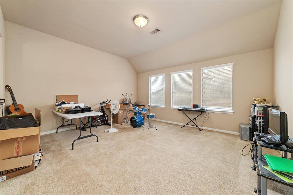 Upstair is where a big game room located, with triple window for natural sunlight.