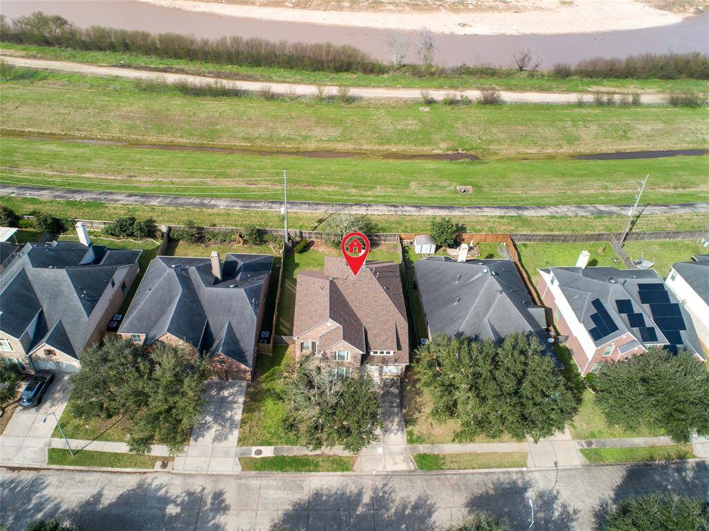 Backyard face to river bank area, however the house has never been flooded.