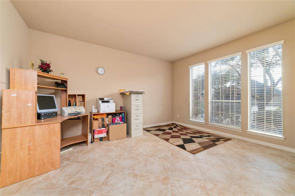 This area can be used as home office/study or formal living area.