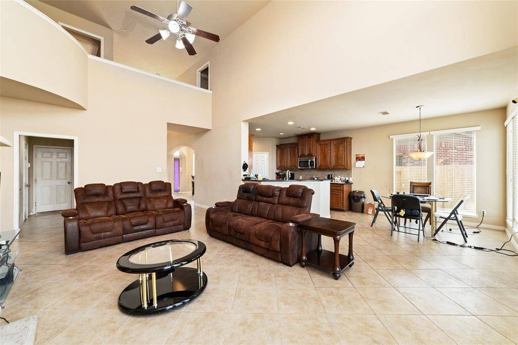 Kitchen opens up to family room.