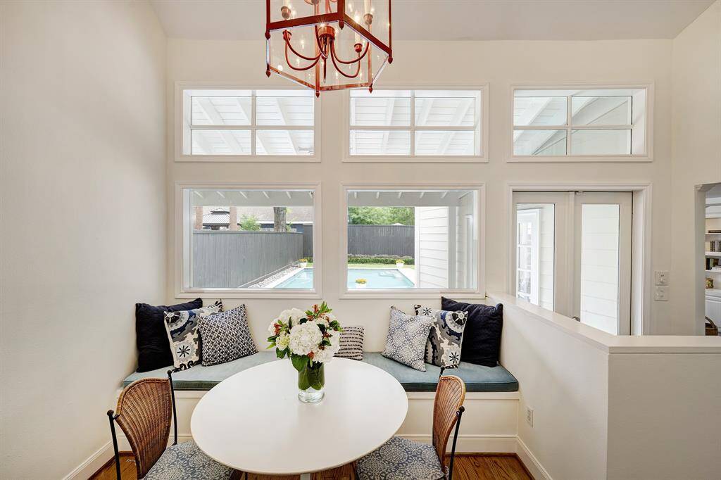 By far one of the prettiest breakroom rooms you have ever seen! The banquette was cleverly added to offer additonal seating options and is a nice reading respite.