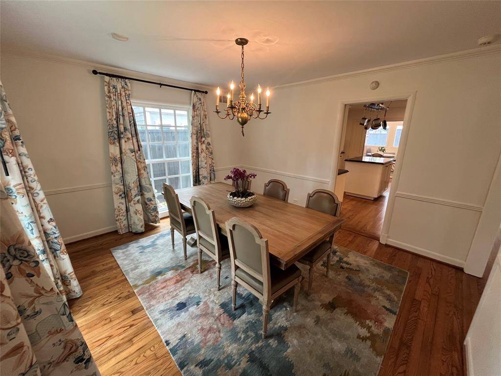 The elegant entry hall leads you to the living, dining, and central entertaining areas from the hallway. Don't miss the two storage closets underneath the handsome staircase.