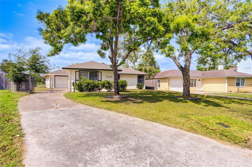 Welcome to 2502 Roy Circle, featuring a long driveway and amazing front yard!