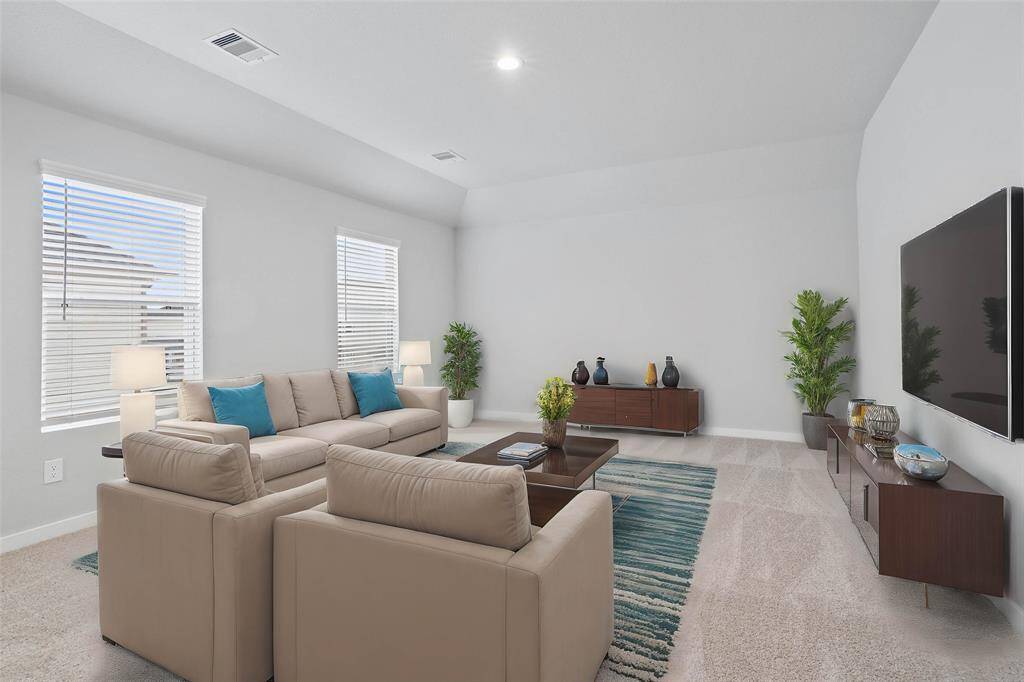 Perfect for entertaining is this amazing game room! Right upstairs this space would be a fabulous teen hangout, media room, or adult game room complete with enough room for a pool table and big screen TVs! Featuring plush carpet, high ceilings, custom paint and large windows with privacy blinds!