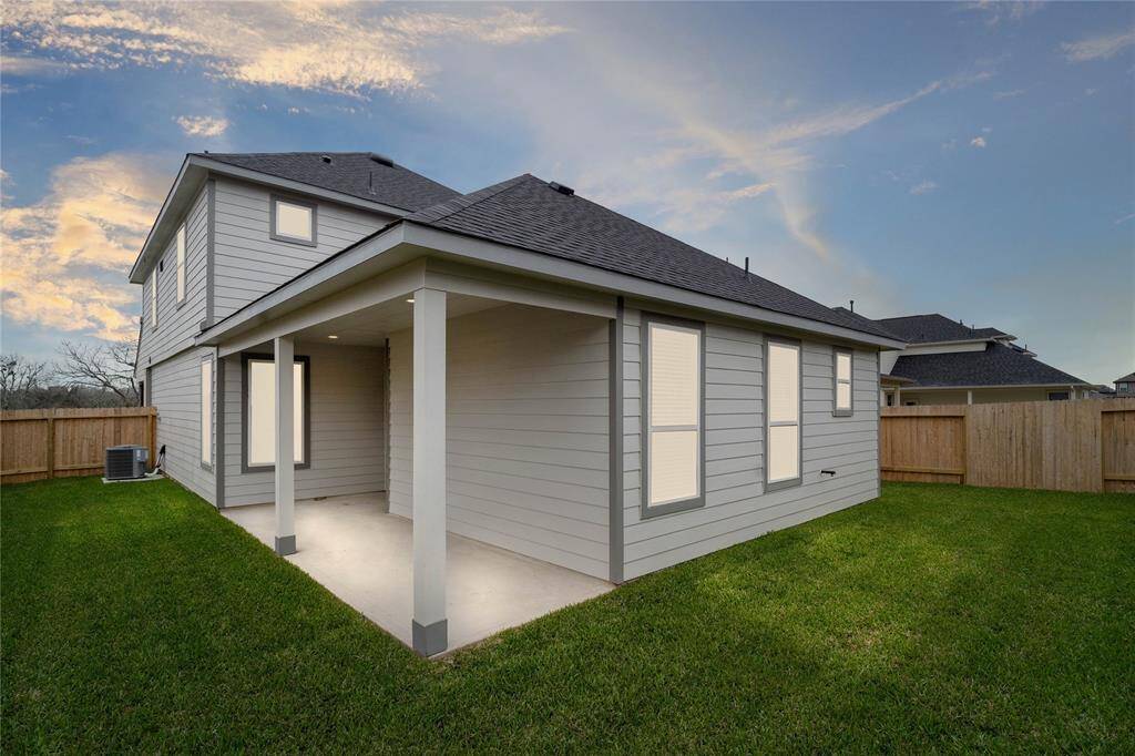 This amazing backyard with its covered patio provides enough space for many activities! From fun summer outdoor parties, to roasting marshmallows in the winter, this gorgeous backyard gives you the ability for many days/nights of memories!