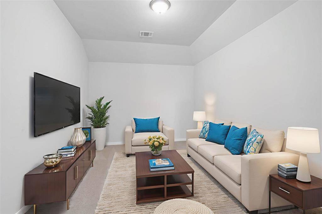 Grab the popcorn, put on a movie, and enjoy a wonderful evening in your amazing media room! Featuring plush carpet, custom paint, and lighting makes this the perfect room for relaxing!