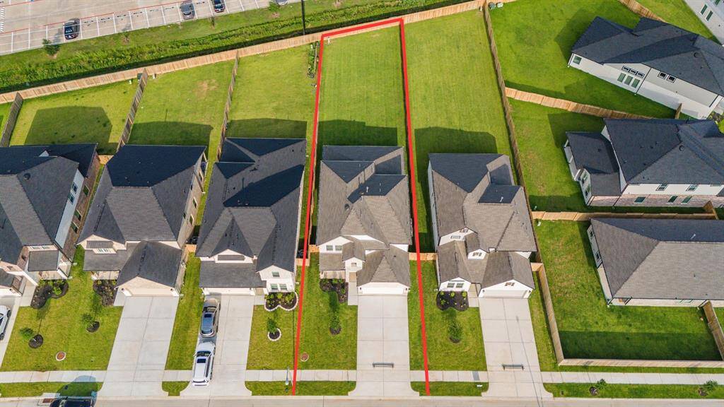 This home sits on a LARGE LOT with ample space in front and the back, lush landscaping and a well-maintained yard.